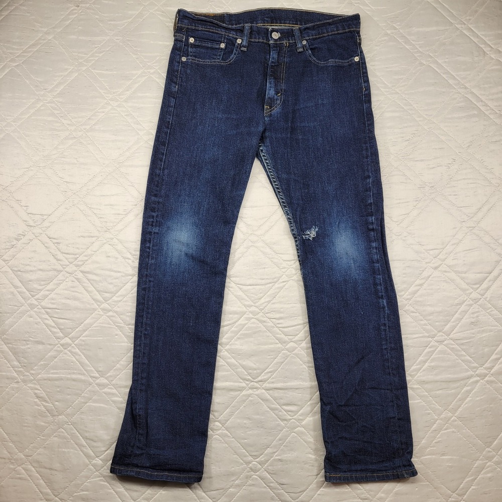 Levis 513 distressed blue jeans size 31X30‎